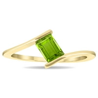 Ženski prsten od smaragdno izrezanog peridota u obliku vala u 10K žutom zlatu